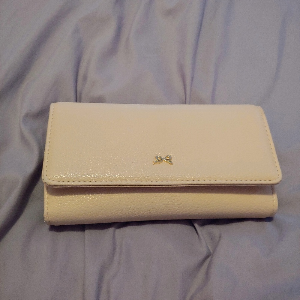 Charming Charlie cream multi pocket wallet